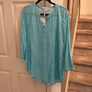 Turquoise and white print blouse